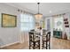 Charming dining room with a table for four and decorative accents at 5716 Colony Glen Rd, Lithia, FL 33547