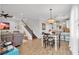 Open concept dining area with chandelier and view of living room at 5716 Colony Glen Rd, Lithia, FL 33547