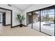 Bright interior with sliding glass doors leading to a pool at 5809 Cruiser Way, Tampa, FL 33615