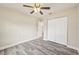 Bedroom with vinyl flooring, ceiling fan and closet at 5915 29Th Avenue E Dr, Bradenton, FL 34208