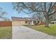 Updated single story home with new paint, landscaping, and driveway at 5915 29Th Avenue E Dr, Bradenton, FL 34208