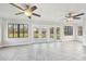 Sun-drenched Gathering room featuring herringbone tile and French doors at 5915 29Th Avenue E Dr, Bradenton, FL 34208