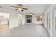 Bright Gathering room with fireplace, tile floors, and access to backyard at 5915 29Th Avenue E Dr, Bradenton, FL 34208