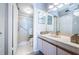 Bathroom with single sink vanity and walk-in shower at 6051 Sun Blvd # 207, St Petersburg, FL 33715