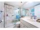 Updated bathroom with walk-in shower and updated vanity at 6051 Sun Blvd # 207, St Petersburg, FL 33715