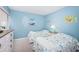 Guest bedroom with twin beds and coastal theme decor at 6051 Sun Blvd # 207, St Petersburg, FL 33715