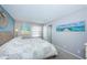 Spacious bedroom with a comfortable bed and calming decor at 6051 Sun Blvd # 207, St Petersburg, FL 33715