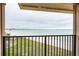 Stunning ocean view from private balcony, showcasing beach and coastline at 6051 Sun Blvd # 207, St Petersburg, FL 33715