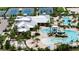 Resort-style community pool, water park, tennis courts, and clubhouse at 6137 Voyagers Pl, Apollo Beach, FL 33572