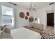 Cozy bedroom featuring a dresser and a calming atmosphere at 6137 Voyagers Pl, Apollo Beach, FL 33572