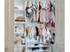 Well-organized closet with shelves and hanging rods at 6137 Voyagers Pl, Apollo Beach, FL 33572