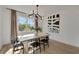 Bright dining room with large window and stylish light fixture at 6137 Voyagers Pl, Apollo Beach, FL 33572