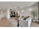 Modern living room with a cozy sectional sofa and fireplace at 6137 Voyagers Pl, Apollo Beach, FL 33572