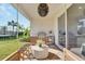 Outdoor kitchen with grill and mini-fridge at 6137 Voyagers Pl, Apollo Beach, FL 33572