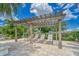 Enjoy the resort-style pergola and lounge chairs at 6137 Voyagers Pl, Apollo Beach, FL 33572