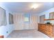 Main bedroom with light blue walls, dresser, and large closets at 6141 Ridgewood Dr, Zephyrhills, FL 33542