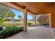 Brick-paved porch with brick columns offering a view of the neighborhood at 6151 Silver Oaks Dr, Zephyrhills, FL 33542