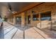 Brick screened porch with ceiling fans and view of trees at 6151 Silver Oaks Dr, Zephyrhills, FL 33542