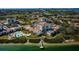 Wide aerial view of waterfront community and golf course at 6218 Palma Del Mar S Blvd # 208, St Petersburg, FL 33715