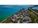 Aerial view of waterfront community with multiple buildings and golf course at 6218 Palma Del Mar S Blvd # 208, St Petersburg, FL 33715