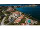 Aerial view of waterfront community, showcasing buildings and pool at 6218 Palma Del Mar S Blvd # 208, St Petersburg, FL 33715