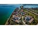 Aerial view of waterfront community with pool and private dock at 6218 Palma Del Mar S Blvd # 208, St Petersburg, FL 33715