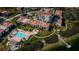 Aerial view of waterfront community with pool and dock at 6218 Palma Del Mar S Blvd # 208, St Petersburg, FL 33715