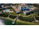 Aerial view of waterfront community with pool and private dock at 6218 Palma Del Mar S Blvd # 208, St Petersburg, FL 33715