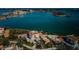 Aerial view of waterfront community with pool and private dock at 6218 Palma Del Mar S Blvd # 208, St Petersburg, FL 33715