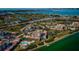 Aerial view of waterfront community with pool and private dock at 6218 Palma Del Mar S Blvd # 208, St Petersburg, FL 33715