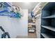 Large walk-in closet with shelving and hanging rods at 6218 Palma Del Mar S Blvd # 208, St Petersburg, FL 33715