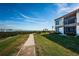 Walkway along the waterfront with gazebo and lawn at 6218 Palma Del Mar S Blvd # 208, St Petersburg, FL 33715