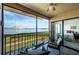 Spacious lanai with water view and seating at 6218 Palma Del Mar S Blvd # 208, St Petersburg, FL 33715