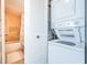 Convenient laundry closet with stackable washer and dryer at 6218 Palma Del Mar S Blvd # 208, St Petersburg, FL 33715