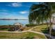 Gazebo with seating overlooking the water, near walking path at 6218 Palma Del Mar S Blvd # 208, St Petersburg, FL 33715