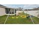 Backyard with swingset and playset at 6325 Chapel Pines Blvd, Wesley Chapel, FL 33545