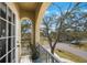 Private balcony overlooking a tree-lined street at 7418 S Morton St, Tampa, FL 33616