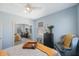 Serene bedroom with a queen-size bed and mirrored closet at 7418 S Morton St, Tampa, FL 33616