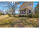 House exterior showcasing the backyard and screened porch at 7418 S Morton St, Tampa, FL 33616