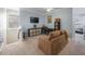 Spacious loft area with couch, desk, and built-in shelving at 7418 S Morton St, Tampa, FL 33616