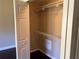 Walk-in closet with wire shelving, providing excellent storage solutions at 8313 Shallow Creek Ct, New Port Richey, FL 34653