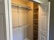 Well-organized closet offering wire shelving for efficient storage at 8313 Shallow Creek Ct, New Port Richey, FL 34653