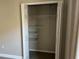 Wire shelving closet with double doors at 8313 Shallow Creek Ct, New Port Richey, FL 34653