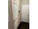 Hallway with linen closet and additional door at 8313 Shallow Creek Ct, New Port Richey, FL 34653