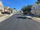 Residential street with townhouses and parked cars at 8313 Shallow Creek Ct, New Port Richey, FL 34653