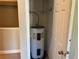 Rheem Glas water heater in a closet at 8313 Shallow Creek Ct, New Port Richey, FL 34653