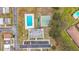 Overhead view of community pool, shuffleboard, and clubhouse at 8330 Vendome N Blvd, Pinellas Park, FL 33781