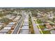 Wide aerial view of neighborhood with houses at 8330 Vendome N Blvd, Pinellas Park, FL 33781