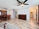 Hardwood floor living room with built-in cabinet and access to bathroom at 8330 Vendome N Blvd, Pinellas Park, FL 33781