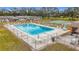 Refreshing community pool with plenty of lounge chairs at 8330 Vendome N Blvd # X, Pinellas Park, FL 33781